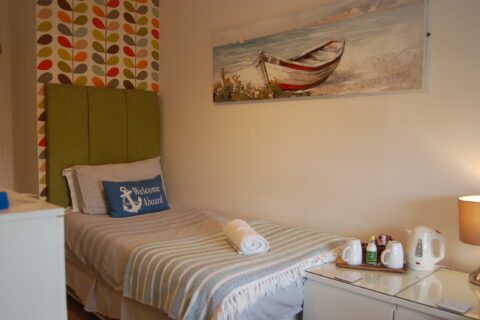 Room Seven with private shower-room Saint Cadfan’s Lodge
